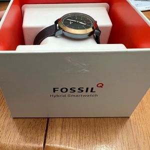Fossil smartwatch. Worn twice. Connects to your phone.